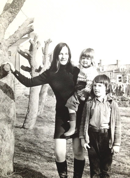 CITY MOTHER DEFIES BULLDOZER TO SAVE APPLE ORCHARD 